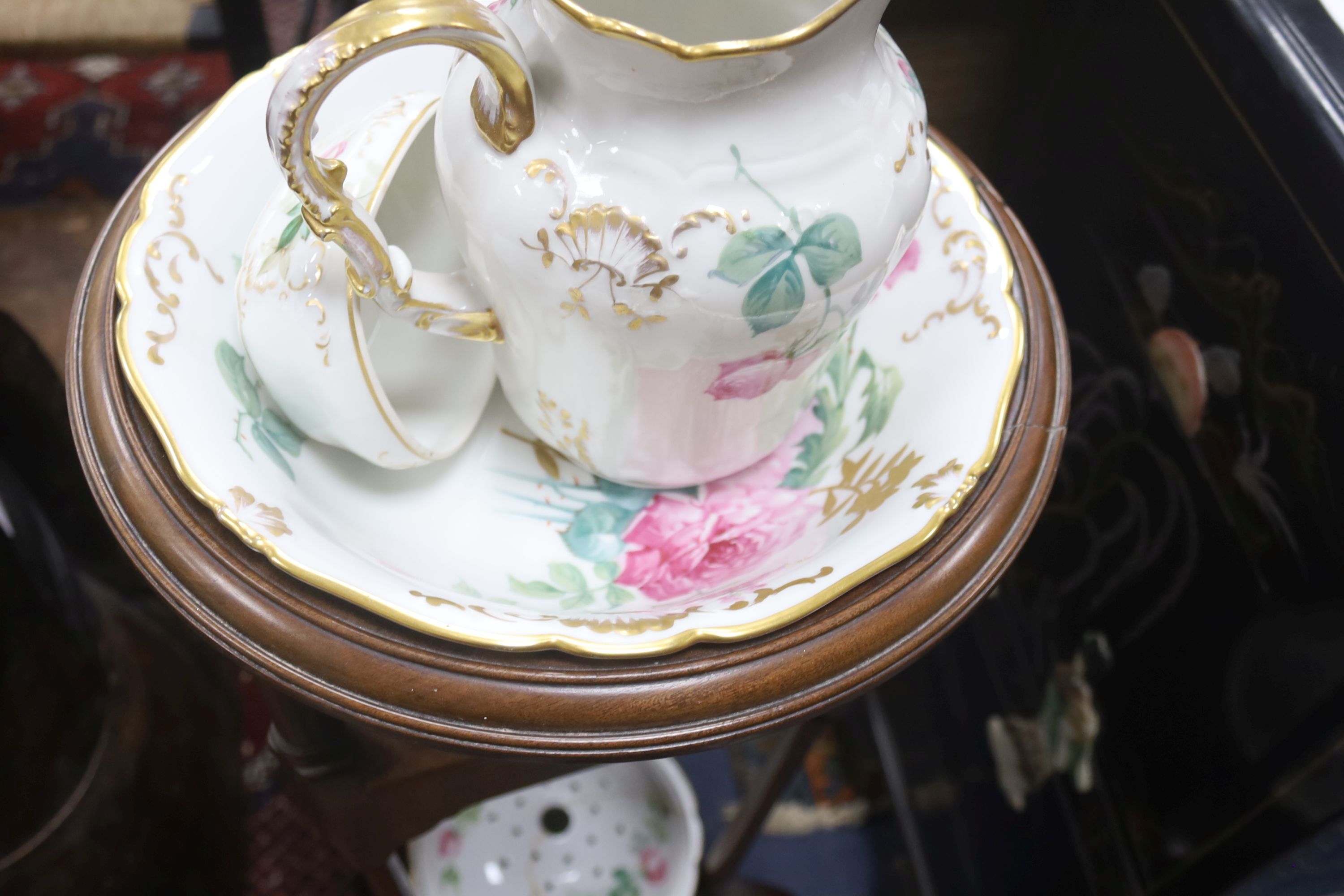 A George II mahogany washstand, together with a Limoges washstand set